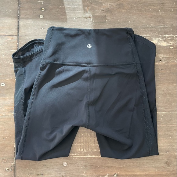 Lululemon black leggings with mesh accent. Size 4. Great condition - Picture 3 of 5